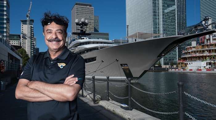 Shad Khan in front of his yacht, Kismet, in London.